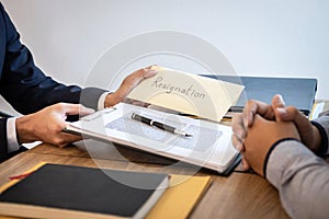 Businessman sending a resignation letter to employer boss in order to dismiss contract, changing and resigning from work concept