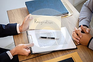 Businessman sending a resignation letter to employer boss in order to dismiss contract, changing and resigning from work concept