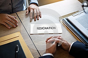 Businessman sending a resignation letter to employer boss in order to dismiss contract, changing and resigning from work concept