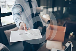 Businessman sending and showing resignation letter to employer boss. Quiting a job, businessman fired or leave a job concpet