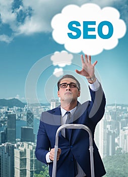 Businessman in SEO search engine optimization concept