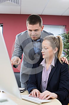 Businessman Sexually Harassing Female Colleague In Office