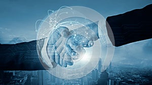 Businessman shaking hands with deal of partnership and customer digital global technology networking link connection on digital