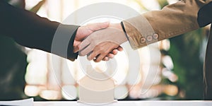businessman shaking hands indicating agreement business ,Investment loan approval ,Buying or mortgaging a home ,Property insurance