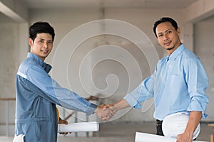 Businessman shaking hands to seal a deal with his partner