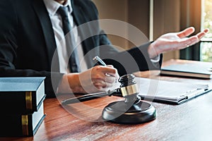 Businessman shaking hands to seal a deal Judges male lawyers Consultation legal services Consulting in regard to the various