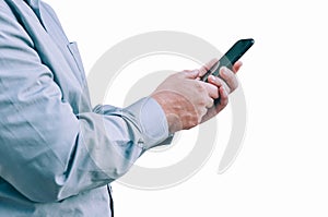Businessman in shirt holding smartphone in hands isolated on white background.
