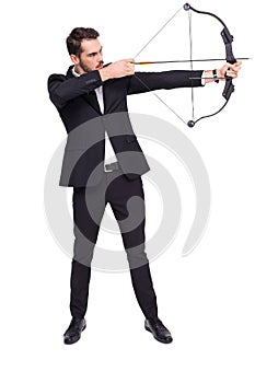 Businessman shooting a bow and arrow