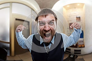 Businessman shouting at office