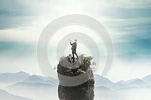 Businessman shouting on the peak