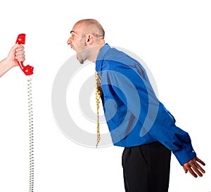 Businessman shouting at Phone