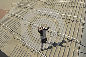 Businessman Shouting On Stairs