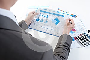 Businessman show analyzing report, business performance