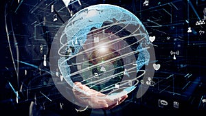 Businessman show hologram of global network communication allusive technology