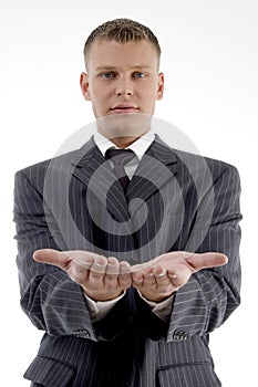 Businessman showing begging gesture