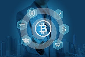 Businessman is showing bitcoin graphic on hands