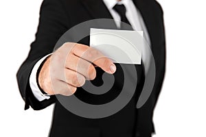 Businessman showing blank business card on white background