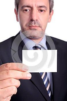 Businessman showing a businesscard