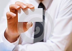 Businessman showing an empty business card