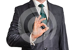 Businessman showing gesture OK