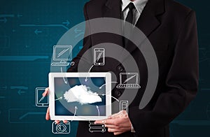 Businessman showing hand drawn cloud computing