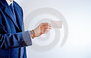 Businessman showing his business card