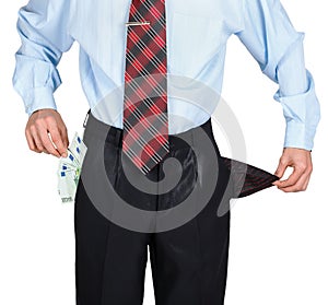 Businessman showing his empty one pocket