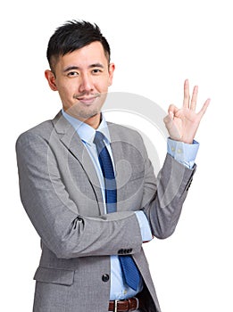 Businessman showing ok sign