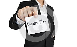 Businessman showing paper note with the word business, isolated on white background