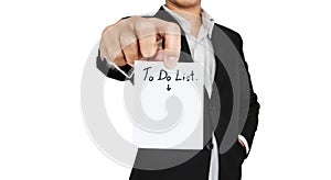 Businessman showing paper note with the word To Do List, isolated on white background