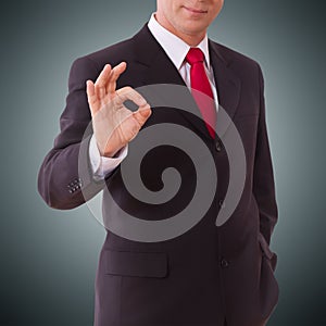 Businessman showing perfect gesture. Hand sign excellent, good, great, okay, yes.
