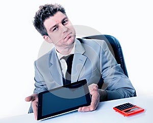 Businessman showing the screen of his digital tablet