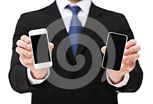 Businessman showing smartphones with blank screens