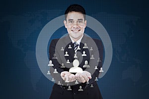 Businessman showing social network icon