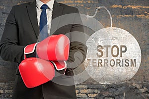 Businessman showing stop terrorism sign