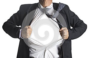 Businessman showing a superhero suit underneath his suit