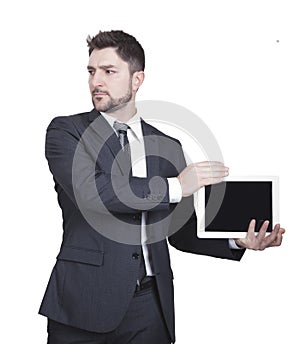 Businessman showing tablet