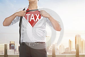 Businessman showing Tax text under his shirt