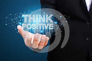 Businessman showing think positive. think positive concept