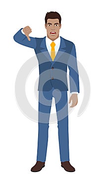 Businessman showing thumb down gesture as rejection symbol