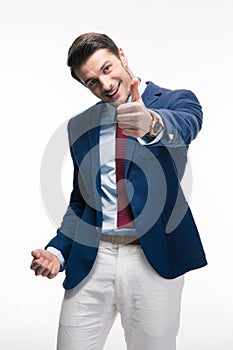 Businessman showing thumb up sign