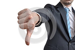 Businessman is showing thumbs down gesture. Isolated on white background