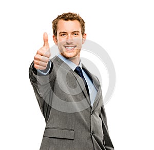 Businessman showing thumbs up sign white background