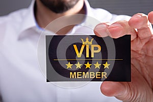 Businessman Showing VIP Member Card