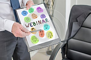 Webinar concept on a clipboard