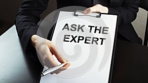 Businessman a shows ASK THE EXPERT text, business details