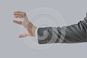 Businessman shows attacking claw hand