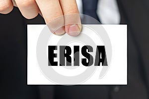 Businessman shows a card with the text ERISA