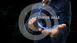 Businessman shows concept hologram Super sale on his hand
