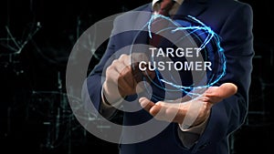 Businessman shows concept hologram Target Customer